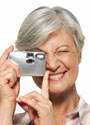 A woman using a camera