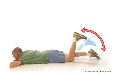 A man doing the active-knee-flexion exercise
